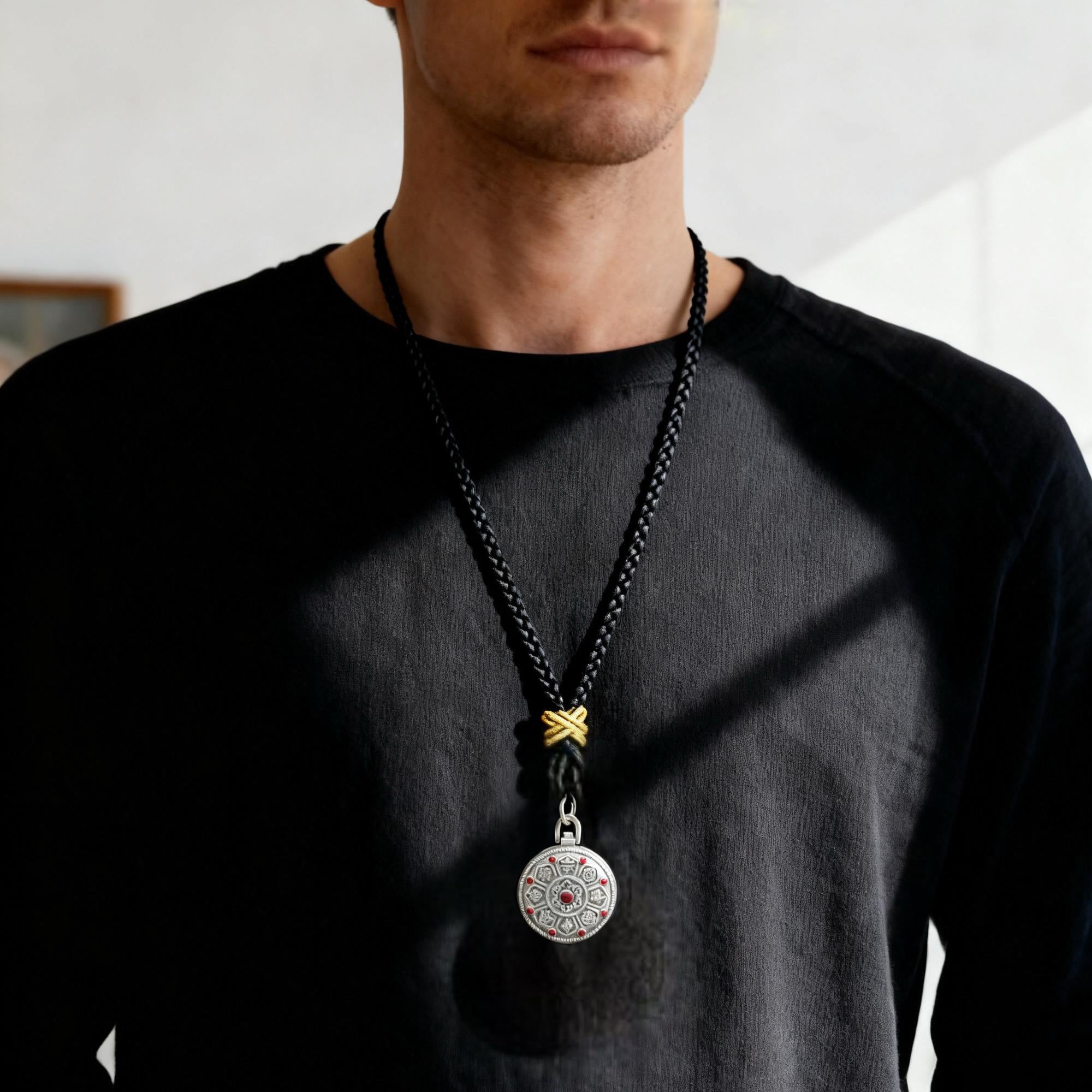 Original Design Eight Auspicious Symbols Kalu Box Pendant, paired with a hand-woven adjustable Perfect Peace necklace.